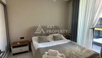 Стильная квартира 2+1 в новом комплексе всего в 150 метрах от моря в районе Махмутлар. - Ракурс 13