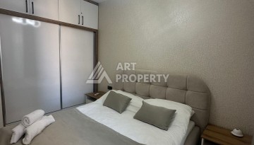 Стильная квартира 2+1 в новом комплексе всего в 150 метрах от моря в районе Махмутлар. - Ракурс 14