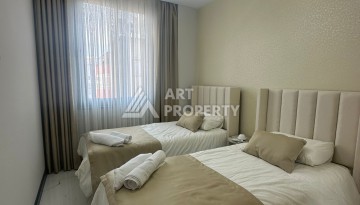 Стильная квартира 2+1 в новом комплексе всего в 150 метрах от моря в районе Махмутлар. - Ракурс 15