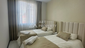 Стильная квартира 2+1 в новом комплексе всего в 150 метрах от моря в районе Махмутлар. - Ракурс 16