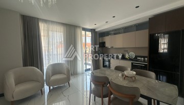 Стильная квартира 2+1 в новом комплексе всего в 150 метрах от моря в районе Махмутлар. - Ракурс 18