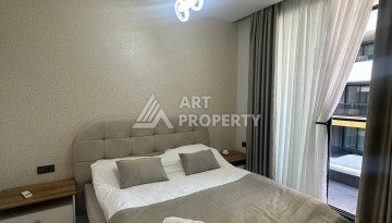 Стильная квартира 2+1 в новом комплексе всего в 150 метрах от моря в районе Махмутлар. - Ракурс 19