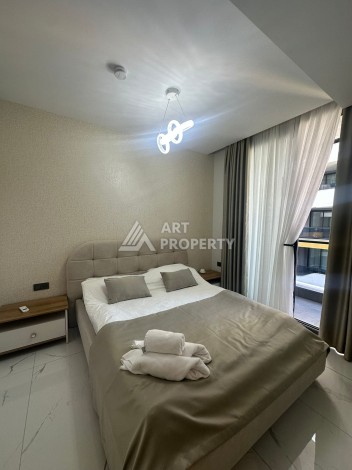 Стильная квартира 2+1 в новом комплексе всего в 150 метрах от моря в районе Махмутлар. - Ракурс 18