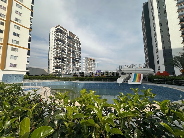 Квартира 1+1 с отдельной кухней в районе Томюк, Мерсин — 450 м до моря - Ракурс 0