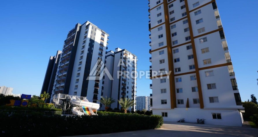 Квартира 1+1 с отдельной кухней в районе Томюк, Мерсин — 450 м до моря - Ракурс 2