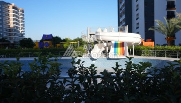 Квартира 1+1 с отдельной кухней в районе Томюк, Мерсин — 450 м до моря - Ракурс 7