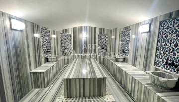 Квартира 1+1 с отдельной кухней в районе Томюк, Мерсин — 450 м до моря - Ракурс 12