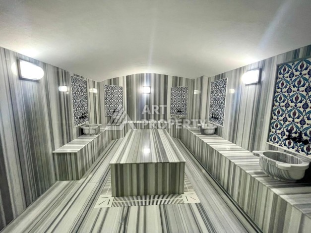 Квартира 1+1 с отдельной кухней в районе Томюк, Мерсин — 450 м до моря - Ракурс 11