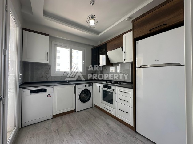 Квартира 1+1 с отдельной кухней в районе Томюк, Мерсин — 450 м до моря - Ракурс 19