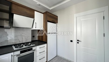 Квартира 1+1 с отдельной кухней в районе Томюк, Мерсин — 450 м до моря - Ракурс 21