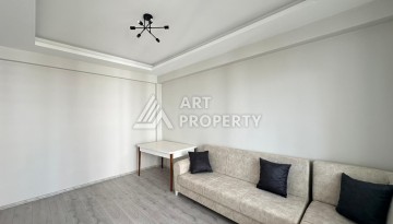 Квартира 1+1 с отдельной кухней в районе Томюк, Мерсин — 450 м до моря - Ракурс 22