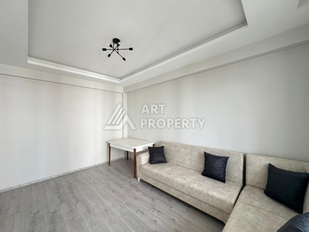 Квартира 1+1 с отдельной кухней в районе Томюк, Мерсин — 450 м до моря - Ракурс 21