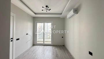 Квартира 1+1 с отдельной кухней в районе Томюк, Мерсин — 450 м до моря - Ракурс 24