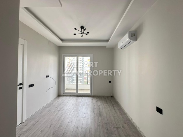 Квартира 1+1 с отдельной кухней в районе Томюк, Мерсин — 450 м до моря - Ракурс 23