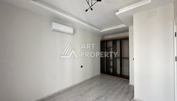 Квартира 1+1 с отдельной кухней в районе Томюк, Мерсин — 450 м до моря - Ракурс 25