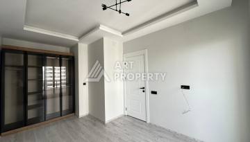 Квартира 1+1 с отдельной кухней в районе Томюк, Мерсин — 450 м до моря - Ракурс 26