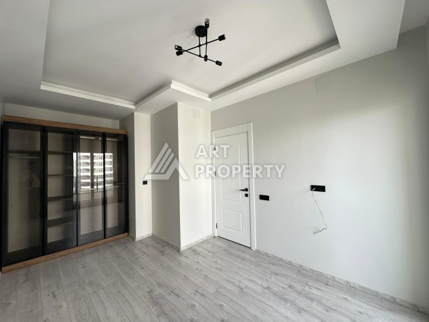 Квартира 1+1 с отдельной кухней в районе Томюк, Мерсин — 450 м до моря - Ракурс 25