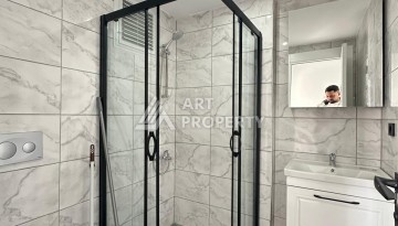 Квартира 1+1 с отдельной кухней в районе Томюк, Мерсин — 450 м до моря - Ракурс 29