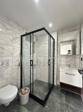 Квартира 1+1 с отдельной кухней в районе Томюк, Мерсин — 450 м до моря - Ракурс 28