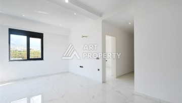 Уютная квартира 1+1 в современном комплексе в районе Махмутлар — отличное решение для жизни и отдыха. - Ракурс 3