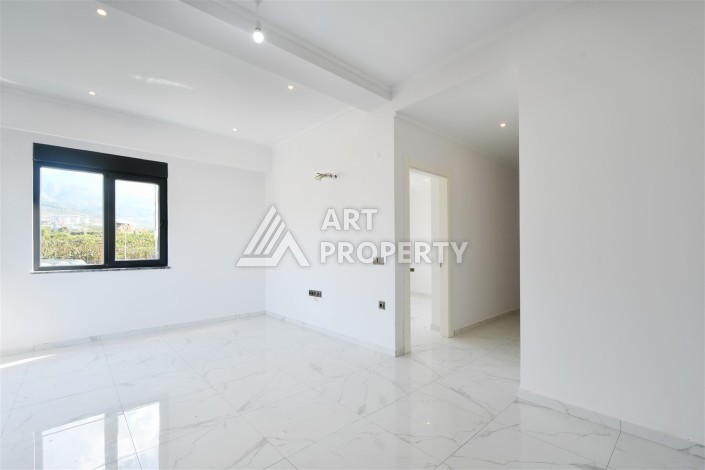 Уютная квартира 1+1 в современном комплексе в районе Махмутлар — отличное решение для жизни и отдыха. - Ракурс 2