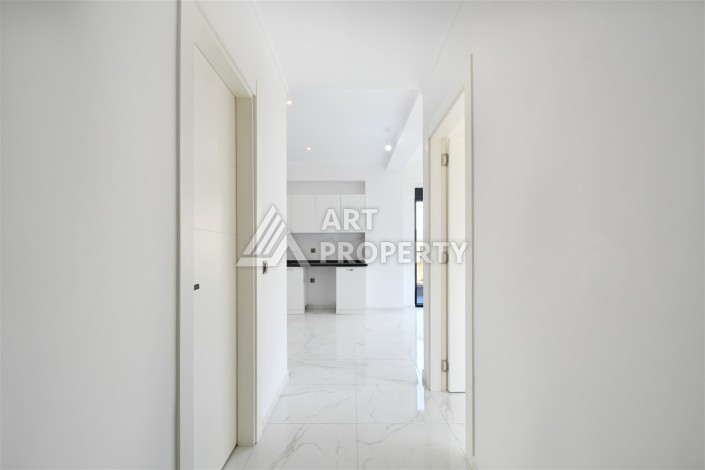 Уютная квартира 1+1 в современном комплексе в районе Махмутлар — отличное решение для жизни и отдыха. - Ракурс 4