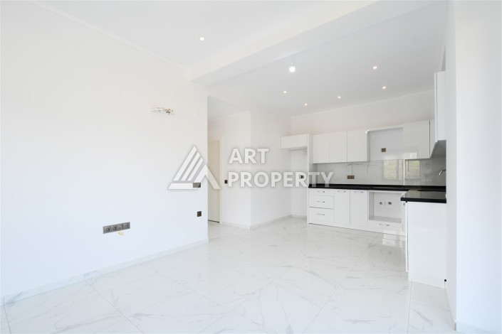 Уютная квартира 1+1 в современном комплексе в районе Махмутлар — отличное решение для жизни и отдыха. - Ракурс 6