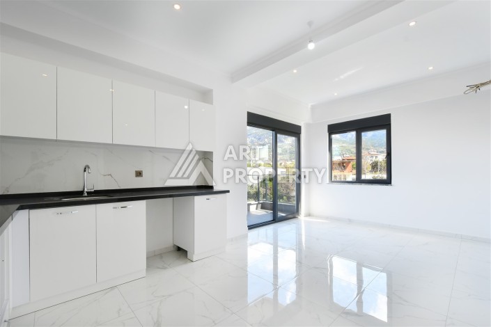 Уютная квартира 1+1 в современном комплексе в районе Махмутлар — отличное решение для жизни и отдыха. - Ракурс 10