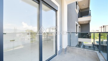 Уютная квартира 1+1 в современном комплексе в районе Махмутлар — отличное решение для жизни и отдыха. - Ракурс 13