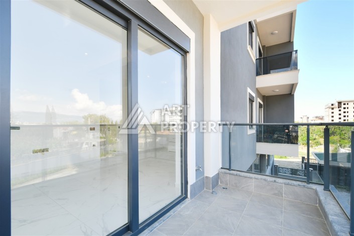 Уютная квартира 1+1 в современном комплексе в районе Махмутлар — отличное решение для жизни и отдыха. - Ракурс 12