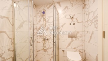 Уютная квартира 1+1 в современном комплексе в районе Махмутлар — отличное решение для жизни и отдыха. - Ракурс 17