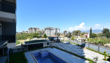 Уютная квартира 1+1 в современном комплексе в районе Махмутлар — отличное решение для жизни и отдыха. - Ракурс 19