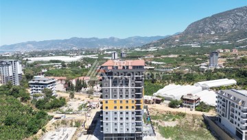 Уютная квартира 1+1 в современном комплексе в районе Махмутлар — отличное решение для жизни и отдыха. - Ракурс 23