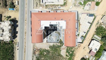 Уютная квартира 1+1 в современном комплексе в районе Махмутлар — отличное решение для жизни и отдыха. - Ракурс 29