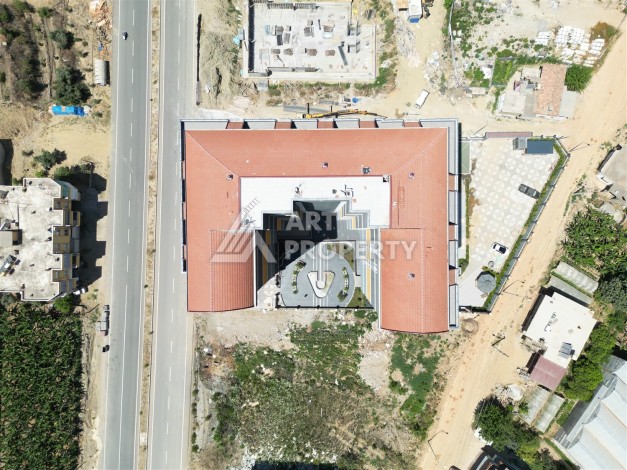 Уютная квартира 1+1 в современном комплексе в районе Махмутлар — отличное решение для жизни и отдыха. - Ракурс 28