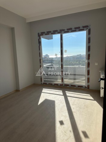 Квартира 1+1 с видом на море в Мерсине, Коджахасанлы, 60 кв.м. - Ракурс 1