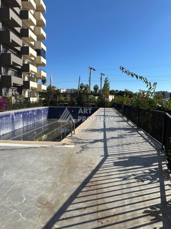 Квартира 1+1 с видом на море в Мерсине, Коджахасанлы, 60 кв.м. - Ракурс 12