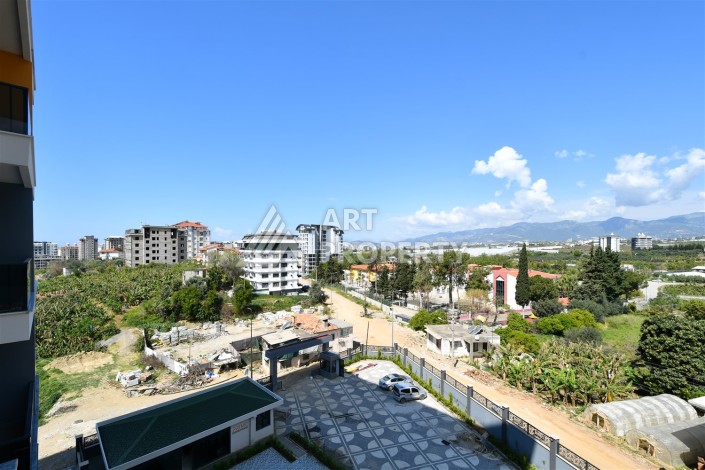 Современная квартира 1+1 в новом комплексе в районе Махмутлар — отличное сочетание цены и качества. - Ракурс 24