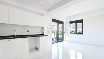 Привлекательная квартира 1+1 в современном комплексе в районе Махмутлар по выгодной цене. - Ракурс 1