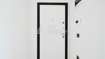 Привлекательная квартира 1+1 в современном комплексе в районе Махмутлар по выгодной цене. - Ракурс 2