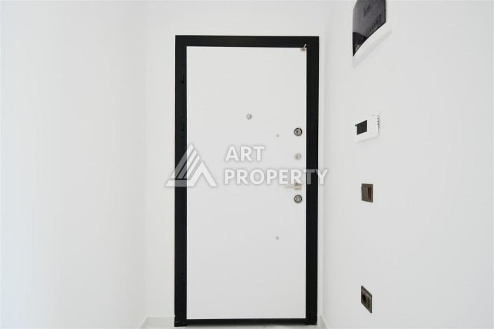 Привлекательная квартира 1+1 в современном комплексе в районе Махмутлар по выгодной цене. - Ракурс 1