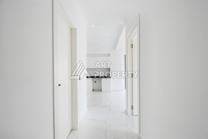 Привлекательная квартира 1+1 в современном комплексе в районе Махмутлар по выгодной цене. - Ракурс 2