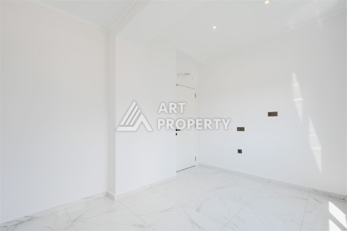 Привлекательная квартира 1+1 в современном комплексе в районе Махмутлар по выгодной цене. - Ракурс 3