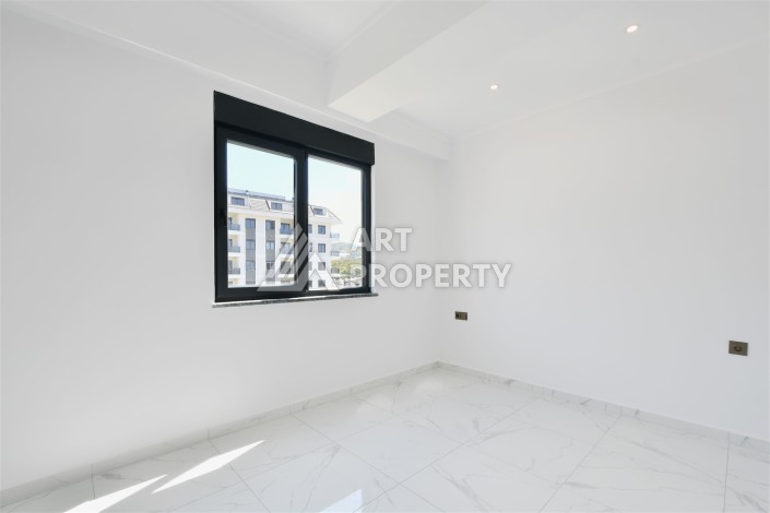 Привлекательная квартира 1+1 в современном комплексе в районе Махмутлар по выгодной цене. - Ракурс 6