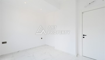 Привлекательная квартира 1+1 в современном комплексе в районе Махмутлар по выгодной цене. - Ракурс 9