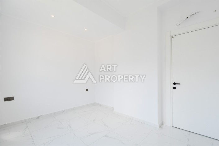 Привлекательная квартира 1+1 в современном комплексе в районе Махмутлар по выгодной цене. - Ракурс 8