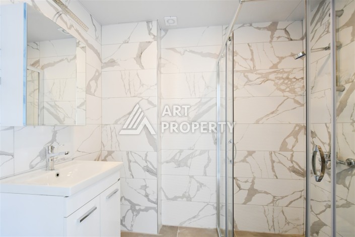 Привлекательная квартира 1+1 в современном комплексе в районе Махмутлар по выгодной цене. - Ракурс 12