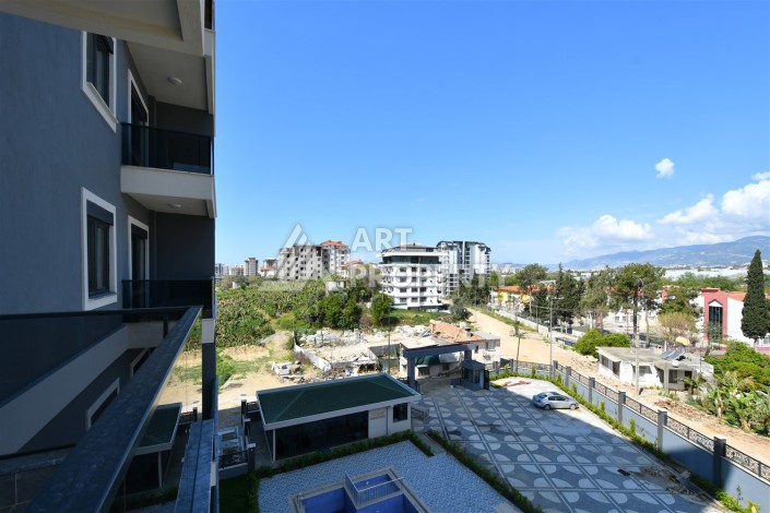 Привлекательная квартира 1+1 в современном комплексе в районе Махмутлар по выгодной цене. - Ракурс 19