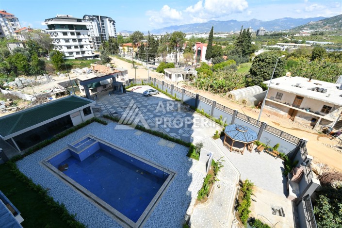 Привлекательная квартира 1+1 в современном комплексе в районе Махмутлар по выгодной цене. - Ракурс 27