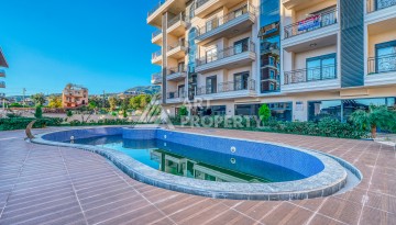 Квартира 1+1 в Оба, Алания, 55 кв.м. Новая резиденция - Ракурс 1